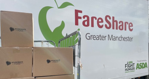 Bounceback Food donations next to a FareShare Greater Manchester delivery van.