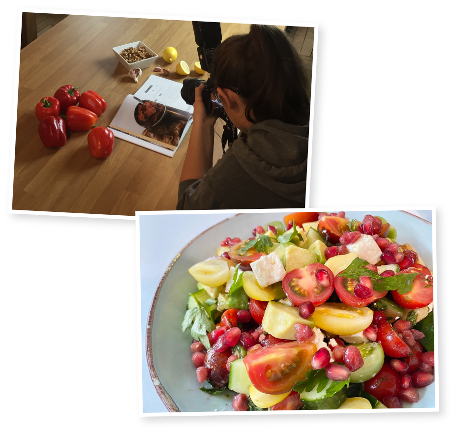 A photographer taking a picture of the Bounceback Food cookbook and a plate of healthy, colourful food.