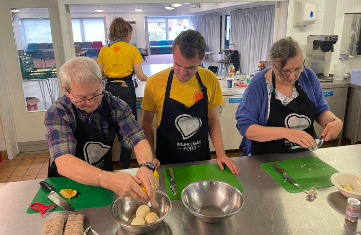 People participate in a Bounceback Food cookery workshop
