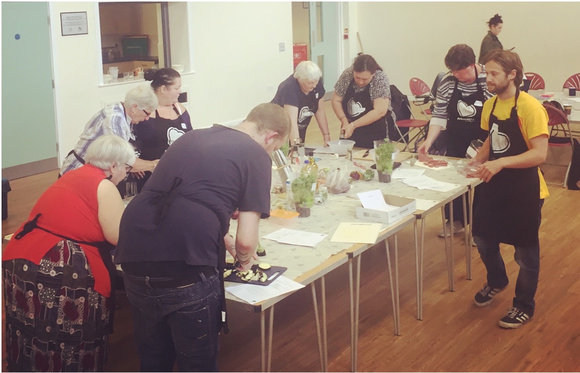 Bounceback Food Community Cookery School workshop takes place within a community centre